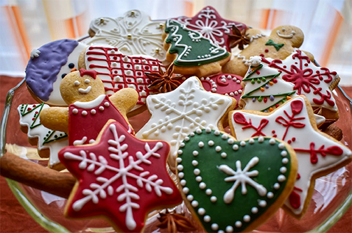 a photo of green, red and white Christmas cookies