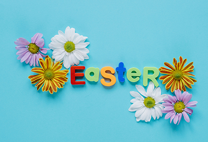 a turquoise background with daisies and the word Easter